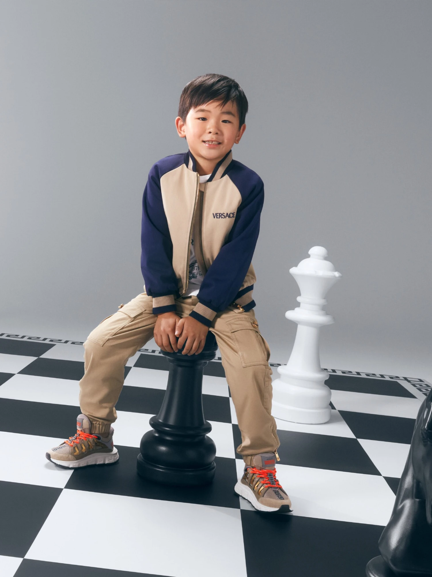 Versace Boys Embroidered Logo Bomber Jacket In Beige 2 Versace Boys Embroidered Logo Bomber Jacket In Beige - Image 2